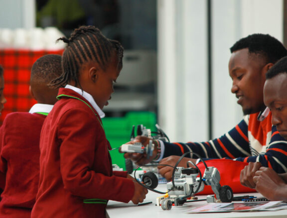 The Robotics program at Kiota School introduces learners to modern technology, engineering, and coding through hands-on experiences. It focuses on designing, building, and programming robots, helping students understand real-world technological applications.