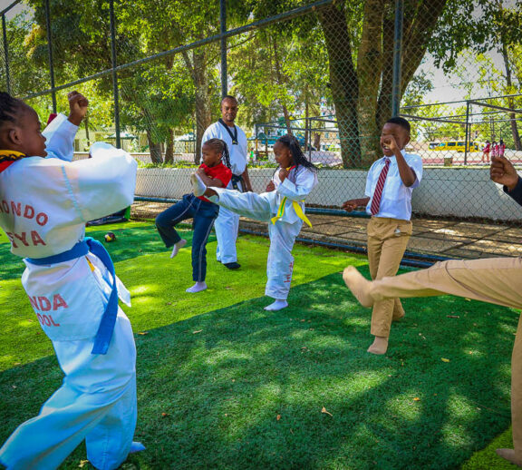 The Taekwondo program at Kiota School focuses on martial arts training, discipline, and self-defense skills. It helps learners build physical strength, agility, and mental focus through structured training.